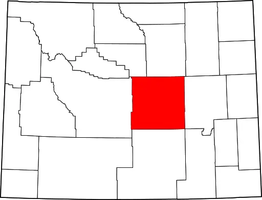 Black and white map of Wyoming with Natrona County in red.